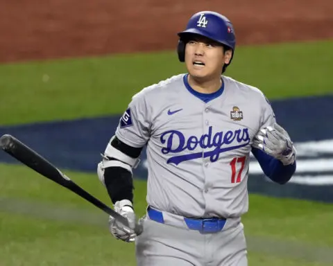 Shohei Ohtani returns after dislocating shoulder, goes hitless as Dodgers take 3-0 World Series lead