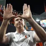 The football alumni are flooding Miami's sidelines. The unbeaten Hurricanes are seeing the benefits