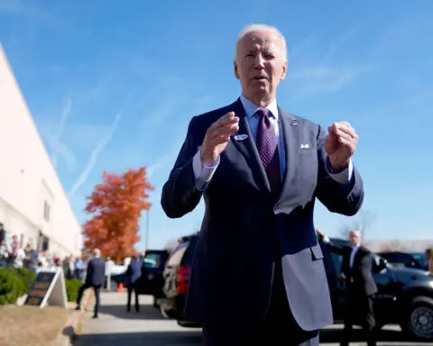 Trump reacts on stage to Biden's 'garbage' comments