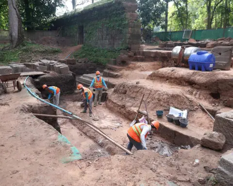 Cambodian archaeologists discover a dozen centuries-old sandstone statues at Angkor UNESCO site