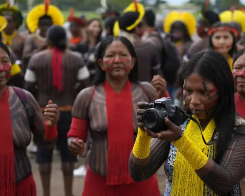 Indigenous people march in Brazil's capital against bill limiting land rights