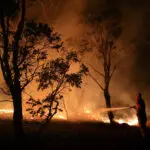 Australia must brace for longer fire seasons and marine heatwaves ahead, report says