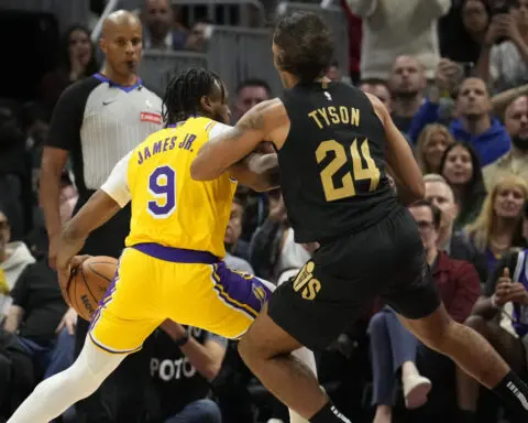 Bronny James feels love from Cleveland while scoring first NBA points in an arena where he grew up