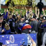 Baseball-Dodgers beat Yankees in wild World Series finale