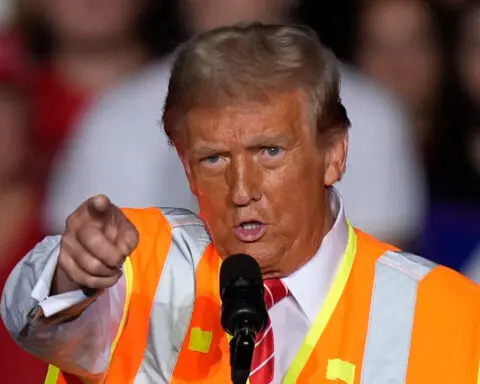 Trump, with a vest and props, turns his attention to trashing Biden over ‘garbage’ gaffe