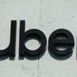 Uber gross bookings growth slows, shares slide