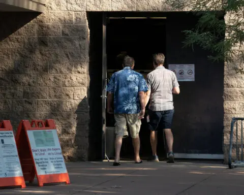 Judge orders Arizona to release names of voters affected by glitch