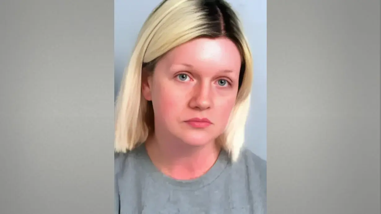 British woman who killed her parents and lived with their bodies is sentenced to life