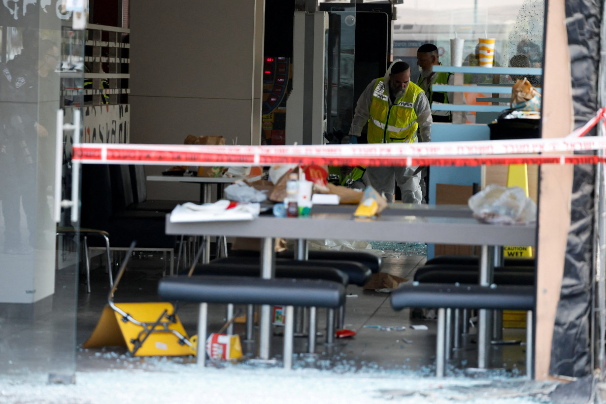 Members of rescue unit ZAKA at the scene of an attack in Beersheba