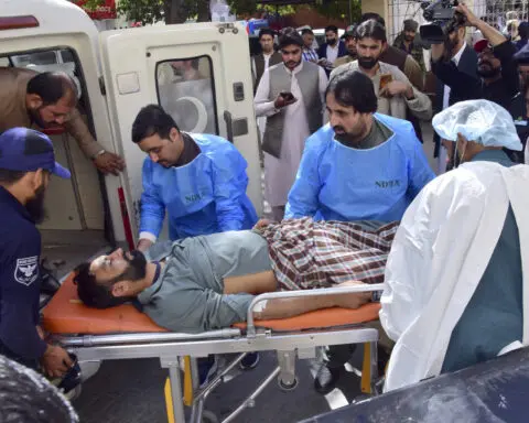 Bomb targeting police assigned for polio drive kills 9 people, including 5 children, in SW Pakistan