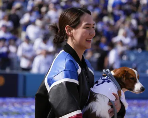 Shohei Ohtani brings his dog and addresses crowd in English as Dodgers celebrate World Series title