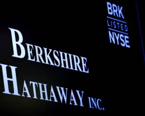 Berkshire's cash soars to $325 billion as Buffett sells Apple, BofA; operating profit falls