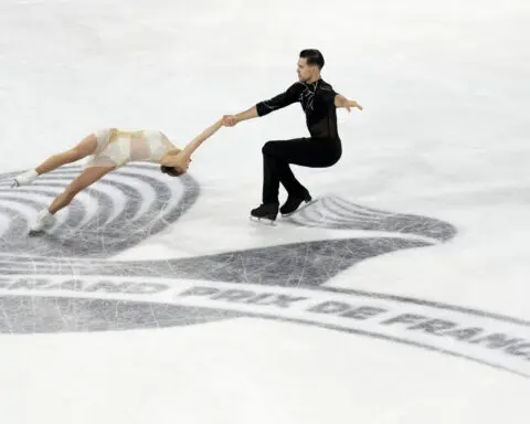 Amber Glenn overcomes a fall to win her first Grand Prix figure skating title