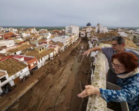 Crashing waves in a hilltop village, a night of terror from Spain's floods