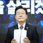 South Korean opposition leader agrees to scrap financial investment tax