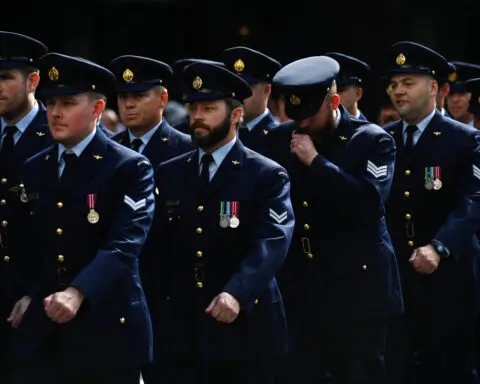 Australia offers troops more cash bonuses to address defence shortfall