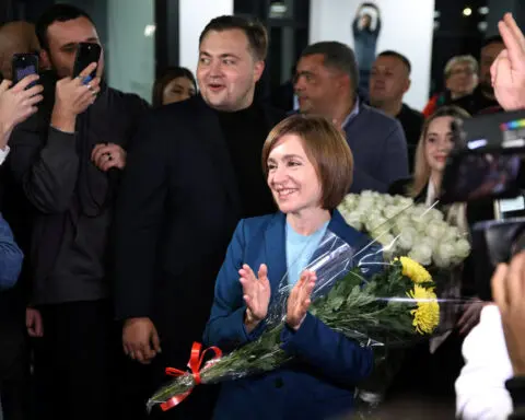 Moldova's Sandu promises to bring change after narrow runoff win