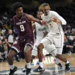 UCF opens season with court-storming 64-61 win over No. 13 Texas A&M