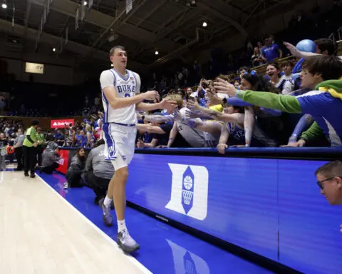 Flagg thrives with all-around game for No. 7 Duke in college debut against his home-state program