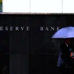 Australia's central bank holds the line on rates even as others ease