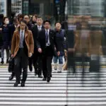 Japan service activity shrinks on softer sales, confidence slips further, PMI shows