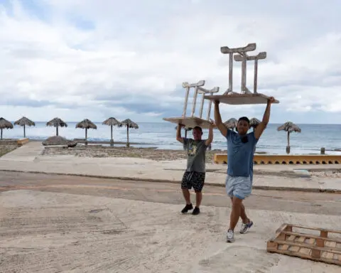 Hurricane Rafael barrels through Cayman Islands