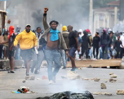 Mozambique police fire tear gas at biggest protest yet against ruling party