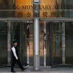 Hong Kong central bank cuts interest rate after Fed move