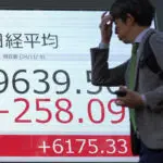 Stock market today: Asian shares gain after US Fed cuts interest rates