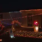 Oak Grove resident decorates home with thousands of lights for 92-year-old neighbor