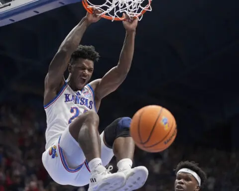 No. 1 Kansas blows 20-point first-half lead, holds on to beat No. 9 North Carolina 92-89