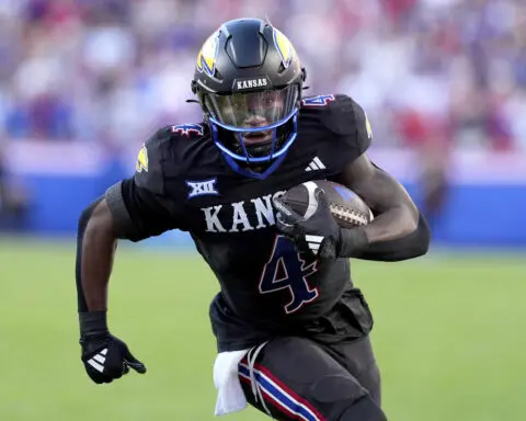 Devin Neal sets Kansas career rushing records in 45-36 victory over No. 17 Cyclones