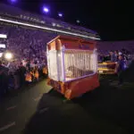 Caged tiger wheeled into LSU's Tiger Stadium for the first time since 2015 at governor's behest