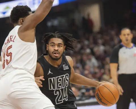 Evan Mobley scores 23 points and Cavaliers rally past Nets 105-100 to remain perfect at 11-0