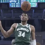 Antetokounmpo jokes around with Brown on court. Brown responds by calling Antetokounmpo 'a child'