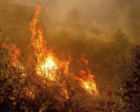 Fire officials describe harrowing conditions as Southern California wildfire exploded