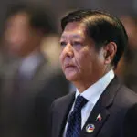 Philippines' Marcos signs tax reform law to lure foreign investment