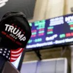 Futures build on Trump-fueled rally; Tesla jumps