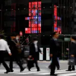 Carlyle, Warburg among investment firms hunting talent in Japan as deals boom