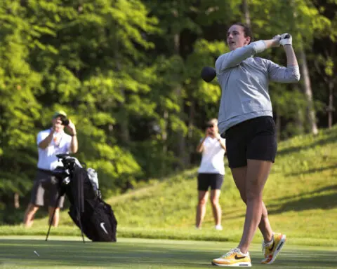 Caitlin Clark steps off the court and onto the fairway to play in an LPGA pro-am