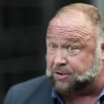 Infowars auction could determine whether Alex Jones is kicked off its platforms