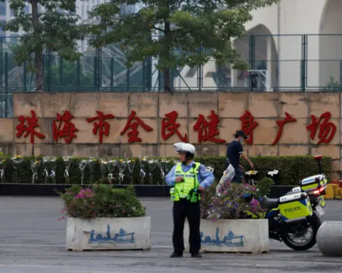 China clears memorial to mass killing victims as government scrambles to respond