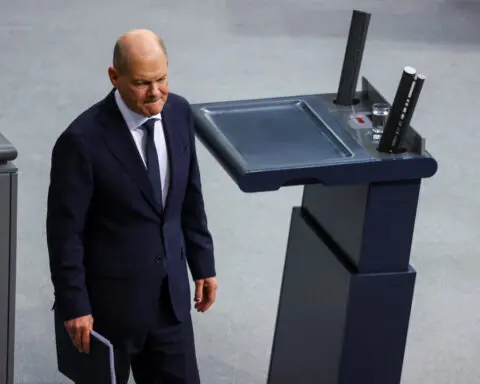 Scholz, fighting for survival, says Germans should not choose between security and prosperity