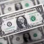 Dollar at one-year high as Trump trade momentum eclipses Fed easing view