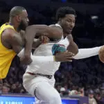 LeBron James has third straight triple-double as Lakers rally for 128-123 victory over Grizzlies