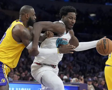 LeBron James has third straight triple-double as Lakers rally for 128-123 victory over Grizzlies