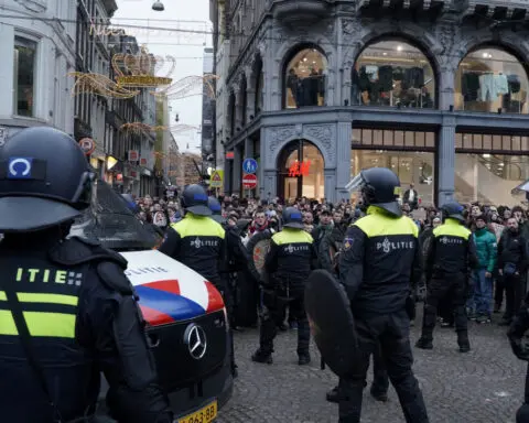 Dutch investigate alleged police violence after banned protest