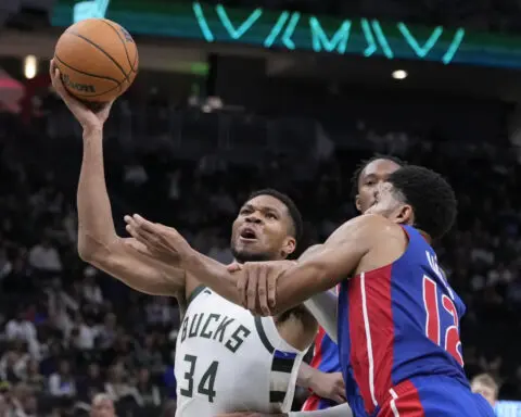 With key teammates out, Antetokounmpo steps up with 59 points to lead Bucks over Pistons in OT