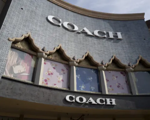 Maker of Coach handbags calls off merger with company that produces Michael Kors accessories