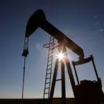 Oil dips on oversupply concerns, heads for weekly loss